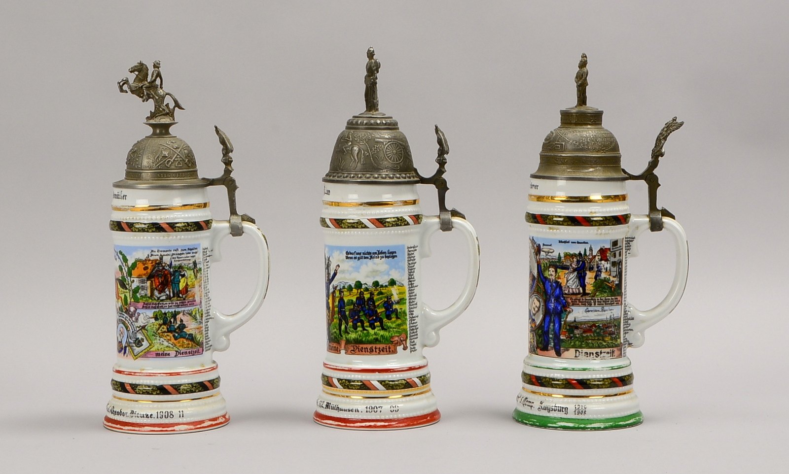3 Reservistenkrüge, versch. Komp./Ausf., figürl. bekrönter Zinndeckel, mit Lithophanie