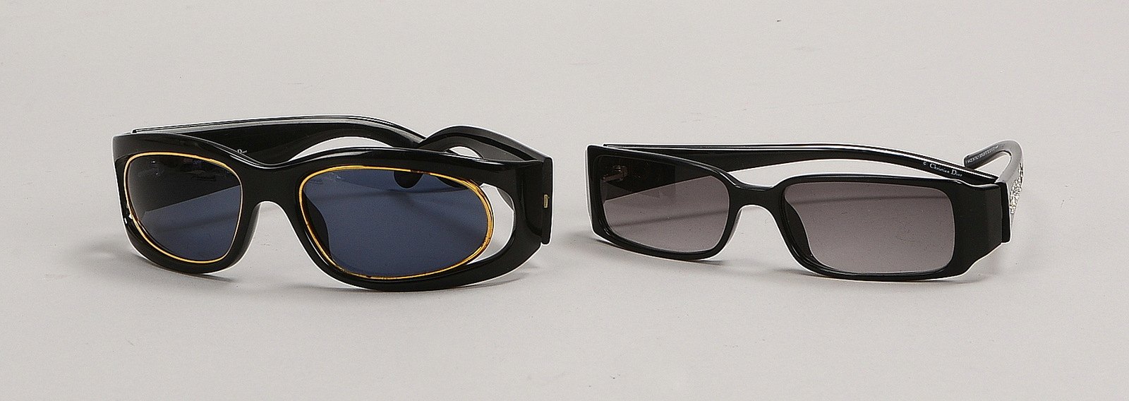 2 Christian Dior-Sonnenbrillen, Mod. 'CD 2040' und 'Diorlight/ST 62', in orig. Hülle