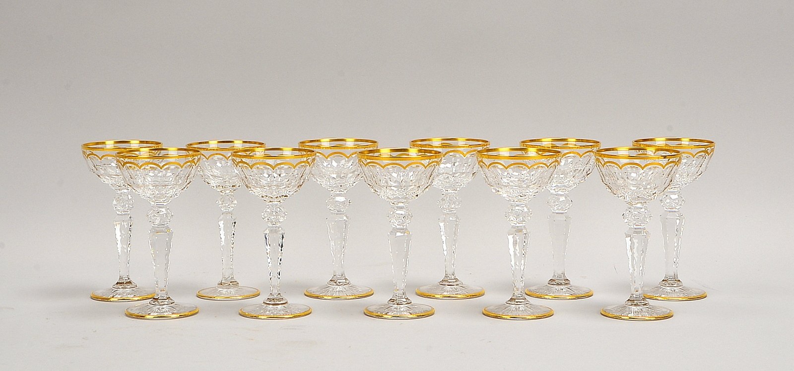 St. Louis/Frankreich, 11 Dessertweingläser, Kristallglas, partiell geschliffen/vergoldet