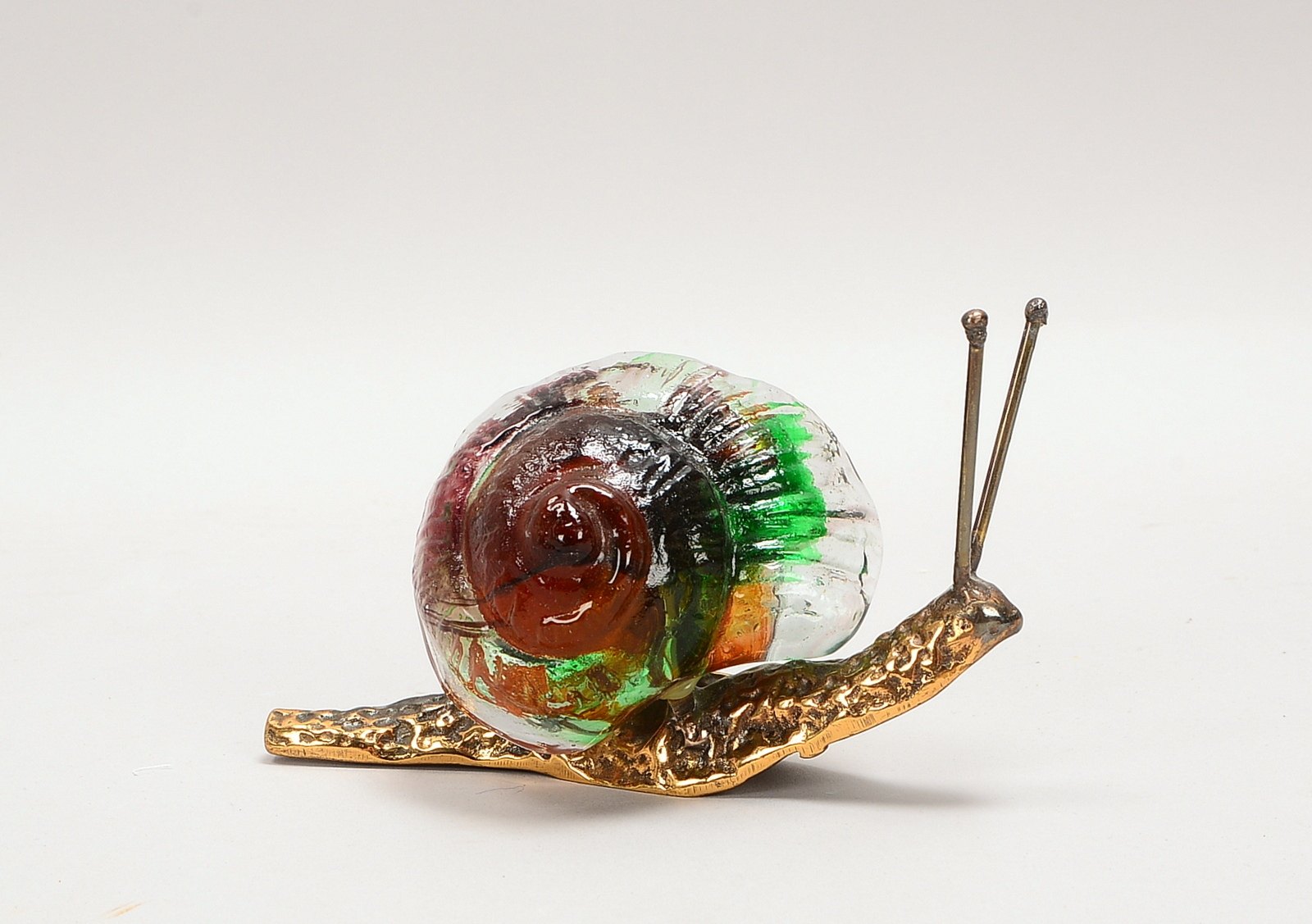 Lohe, Yves (*1947 Frankreich), Skulptur, 'Schnecke', Bronze/farbiges Glas, verso signiert