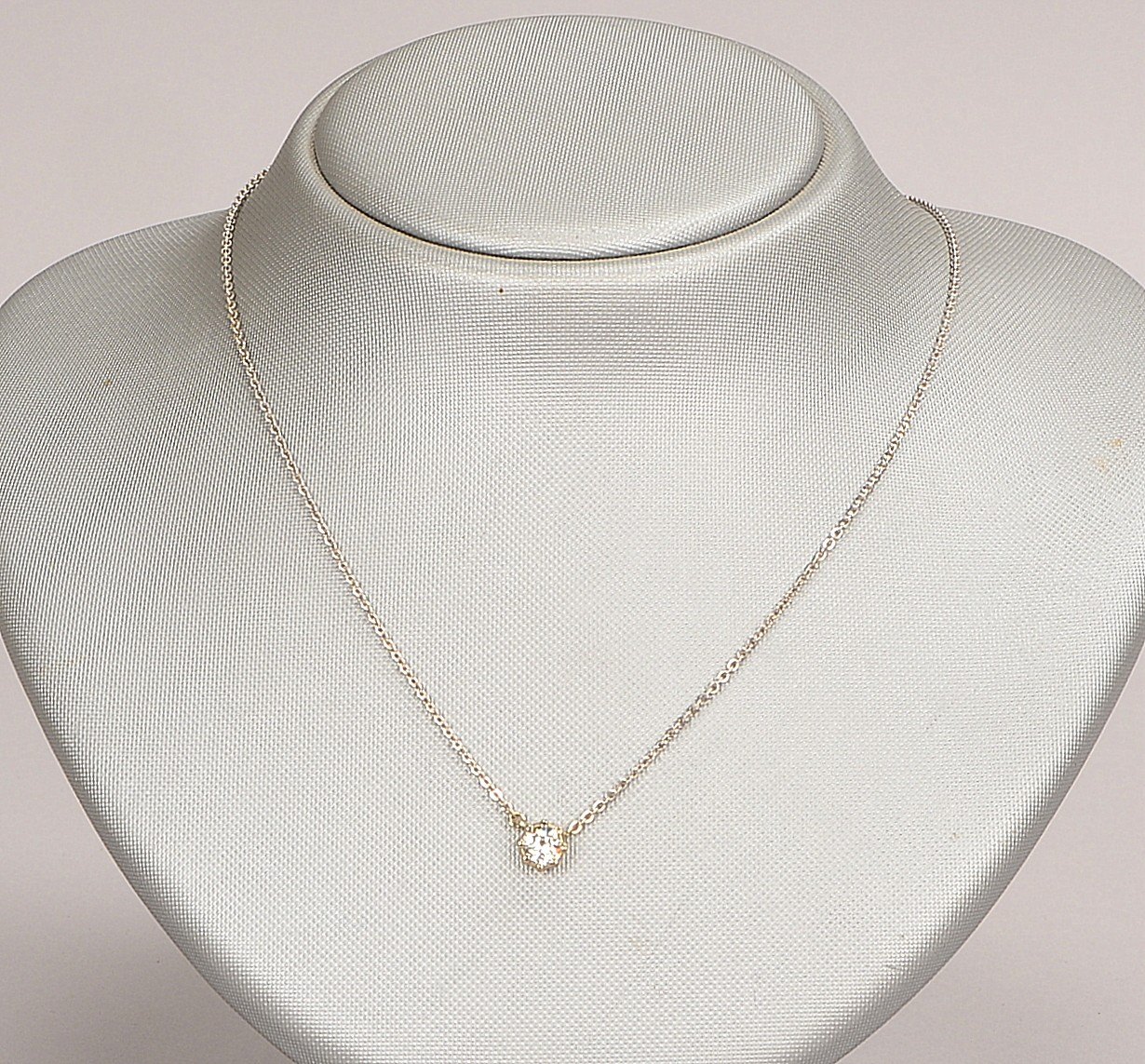 Halskette mit Anhänger, 585 WG (gest.), Anhänger besetzt mit Diamant von ca. 0,65 ct