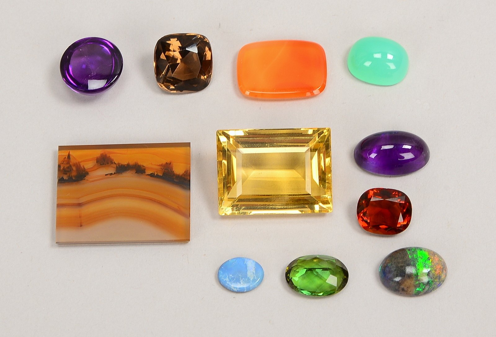 Edelstein-Konvolut, versch. Steine/Schliffe (Citrin, Amethyst, Turmalin, Opal, u.a.)