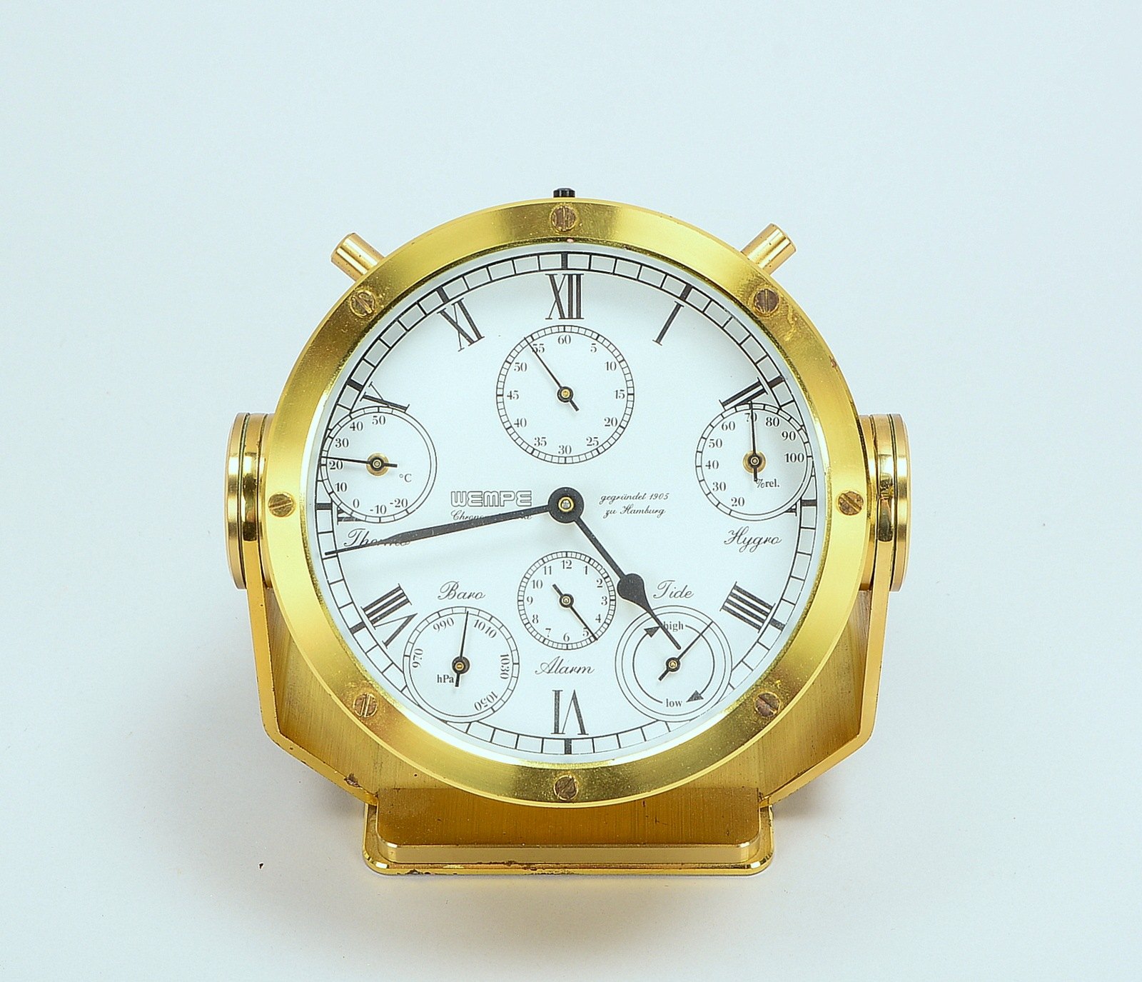 Wempe/Hamburg, Schiffsuhr/Glasenuhr, schwenkb. Messinggehäuse, integr. Barometer