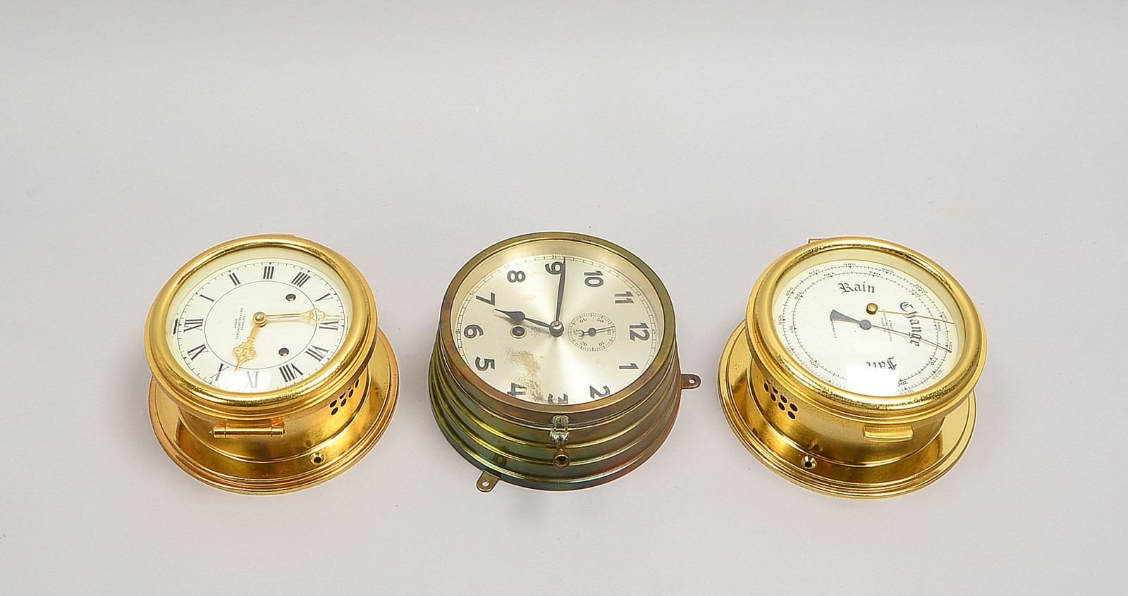 Schiffsuhren, Wempe/Junghans: 2x Uhren und 1 Barometer, verglastes Geh. - Fkt. ungepr.