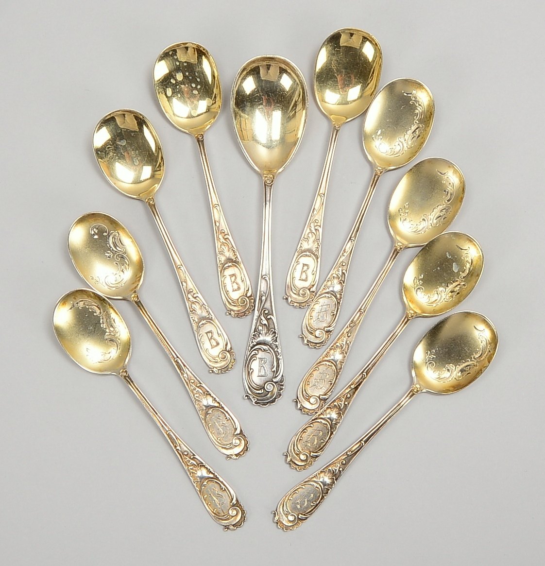 10 Dessertlöffel/Eislöffel, 800 Silber/Laffen vergoldet, partiell ziseliert; Gew. 274 g