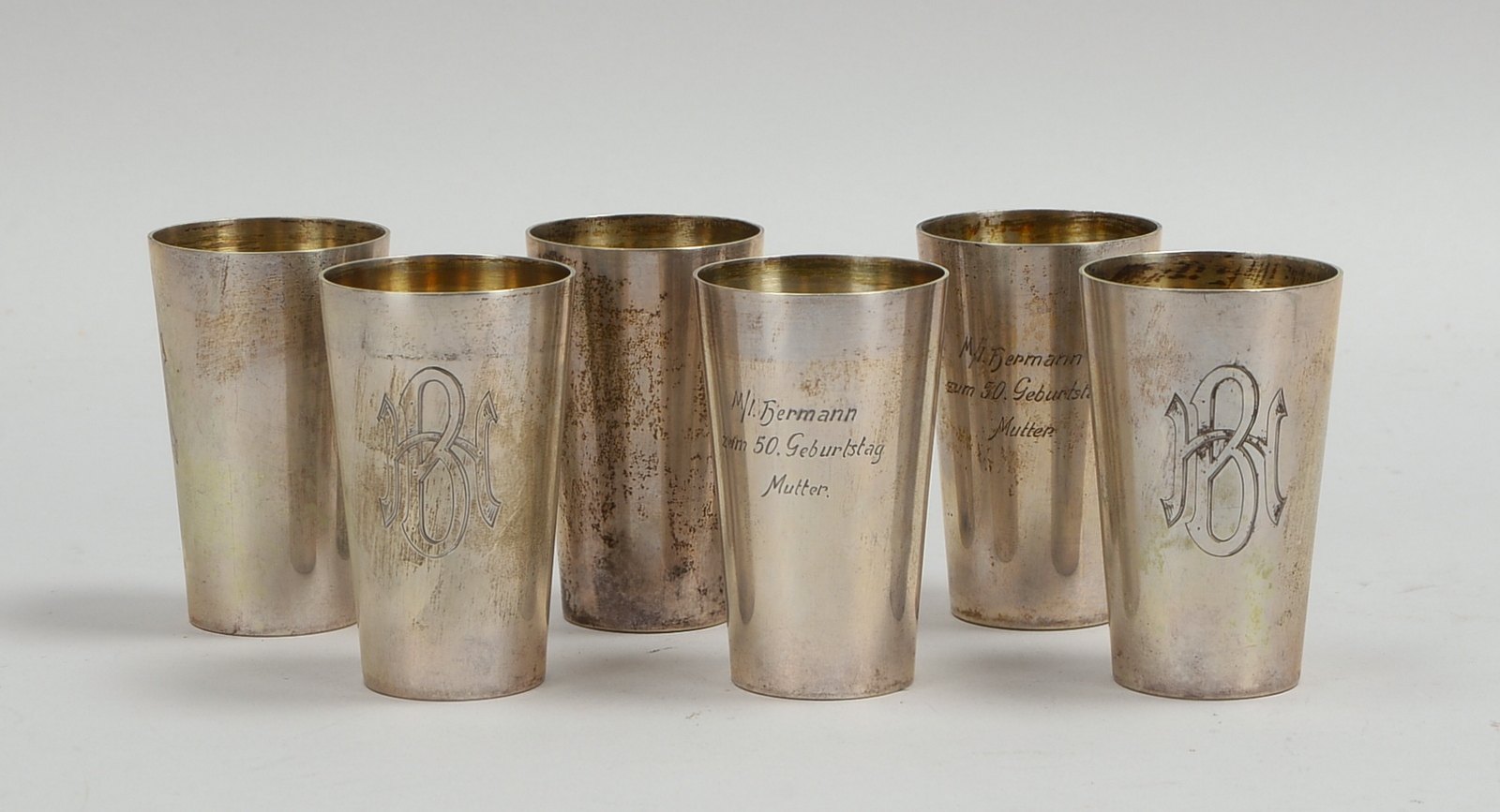 6 Schnapsbecher, 800 Silber, grav. Widmung/Initialen 'HB', Restvergoldung; Gew. 415 g