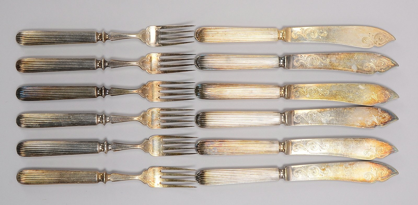 Fischbesteck, versilbert, Klingen und Zinken mit floraler Ziselierung, für 6 Pers.