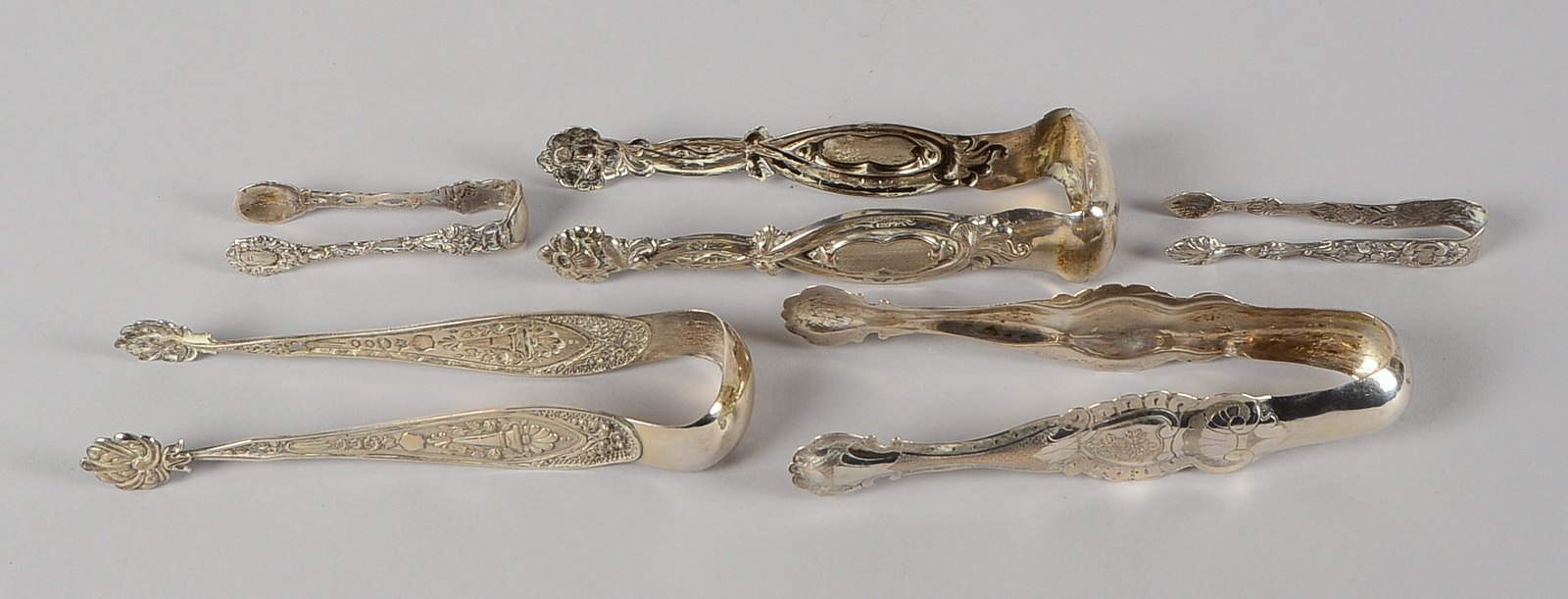 5 Zuckerzangen, versch. Silbergehalte und Ausf.; Länge bis 16 cm; Gew. 120 g
