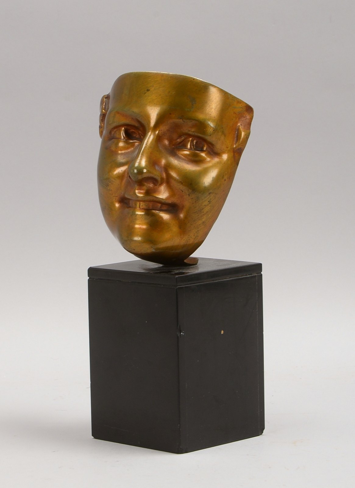 Bronze nach Jean-Baptiste Carpeau, 'Das lachende Gesicht', unsign., auf Marmor-Postament