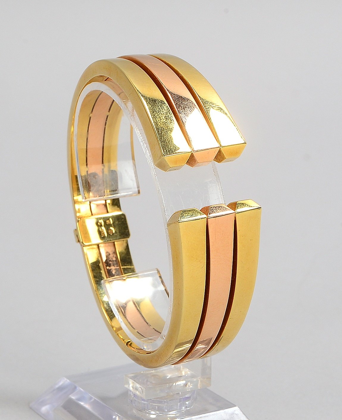 Designer-Armspange, 585 GG/RG (gest.), Schiene verlaufend, scharniert; Gew. 51,30 g