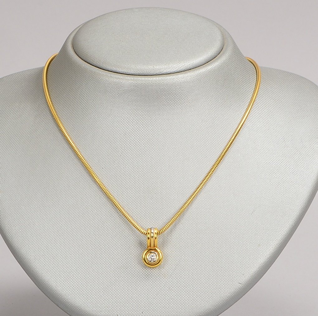Schlangenkette, 585 GG (gest.), mit Brillant-Anh./ca. 0,20 ct, 750 GG/WG (gest.)