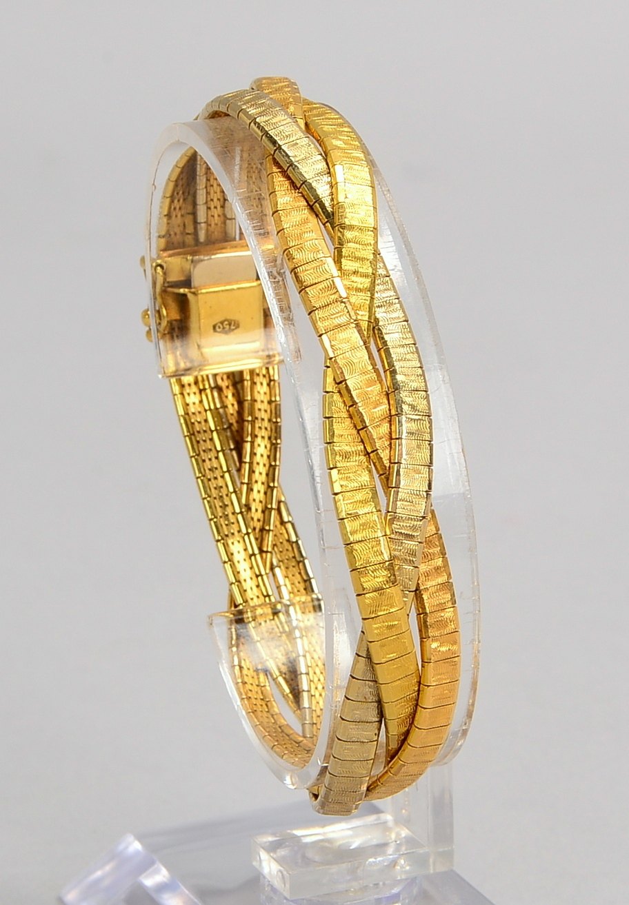 Armband, 750 Gold/tricolor (gest.), geflochten, mit Steckschließe; Gew. 34,30 g