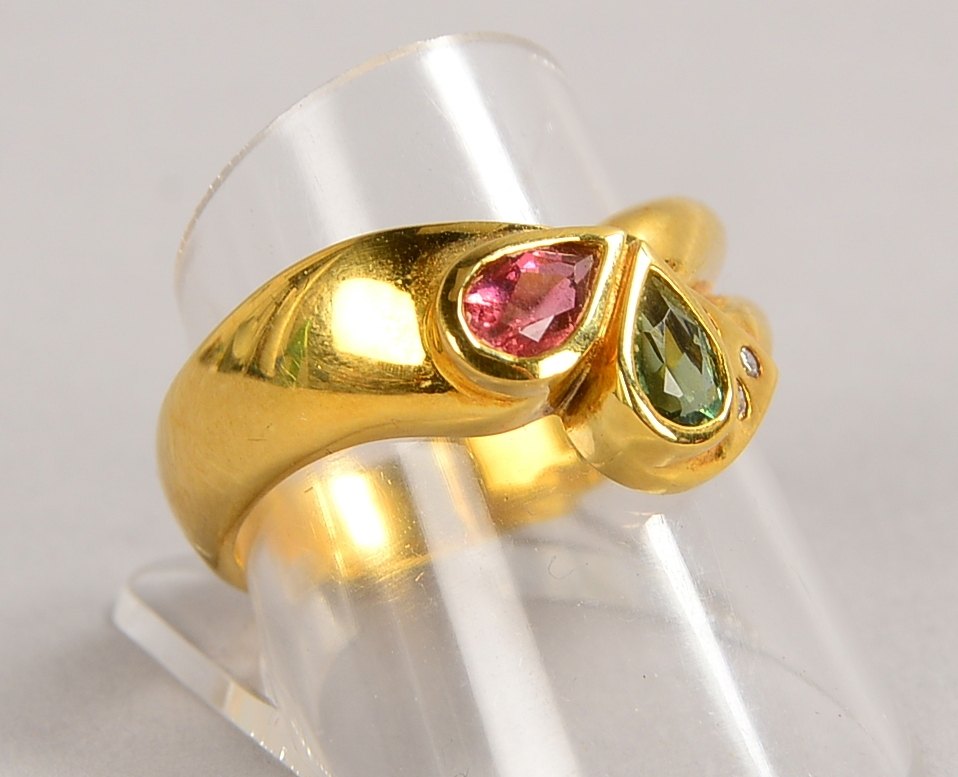 Ring, 585 GG (gest.), mit Rubin, Turmalin und 3x kl. Brill./ca. 0,05 ct; RG 59, Gew. 8 g