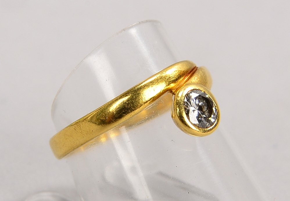 Ring, 750 GG (gepr.), mit einzelnem Brill./ca. 0,31 ct, Farbe 'G-H', 'Si'; RG 54, Gew. 3,30 g