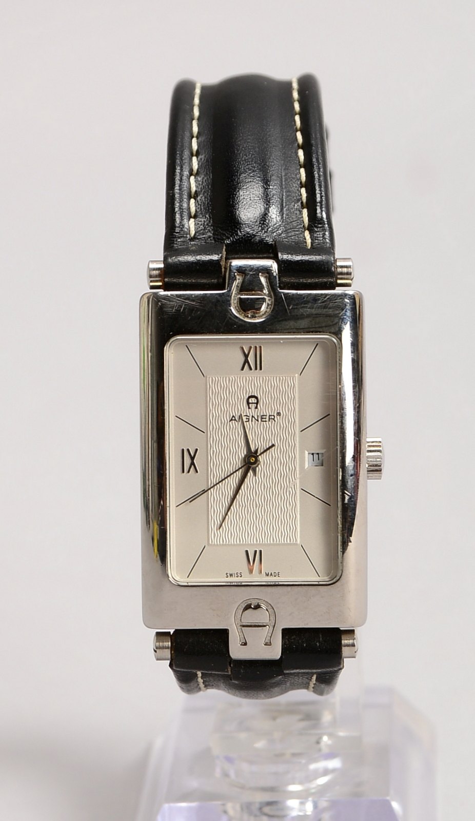 DAU Aigner, Quarz, Edelstahl-Geh. an Lederarmband, Ziffernblatt mit Datumsanz.