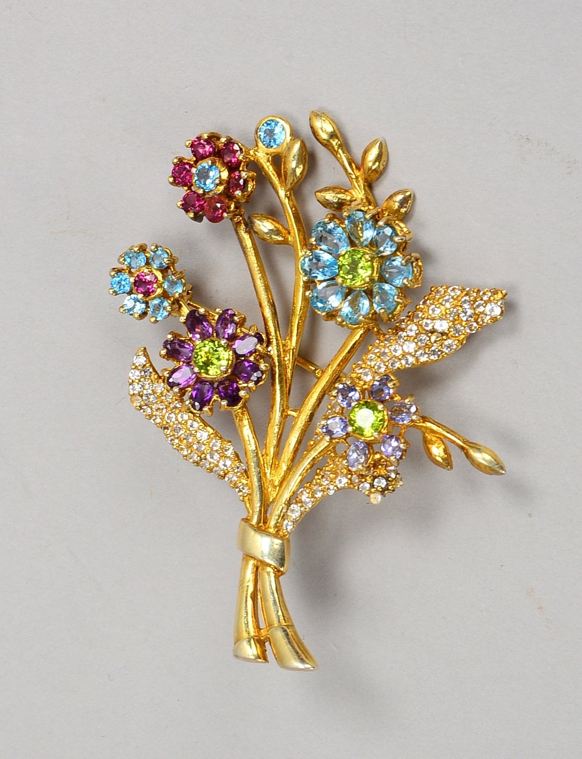Figürl. Brosche, 925 Sterlingsilber/verg., 'Blumenbouquet', farb. Halbedelsteine; Gew. 31 g