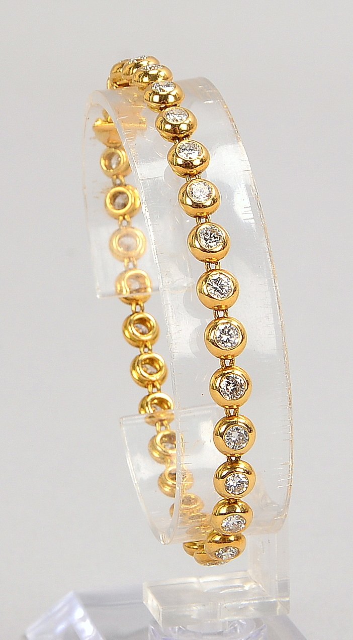 'Tennisarmband', 750 GG (gest.), mit 29x Brillanten/ca. 4,35 ct, Farbe 'G-H'; Gew. 17,57 g