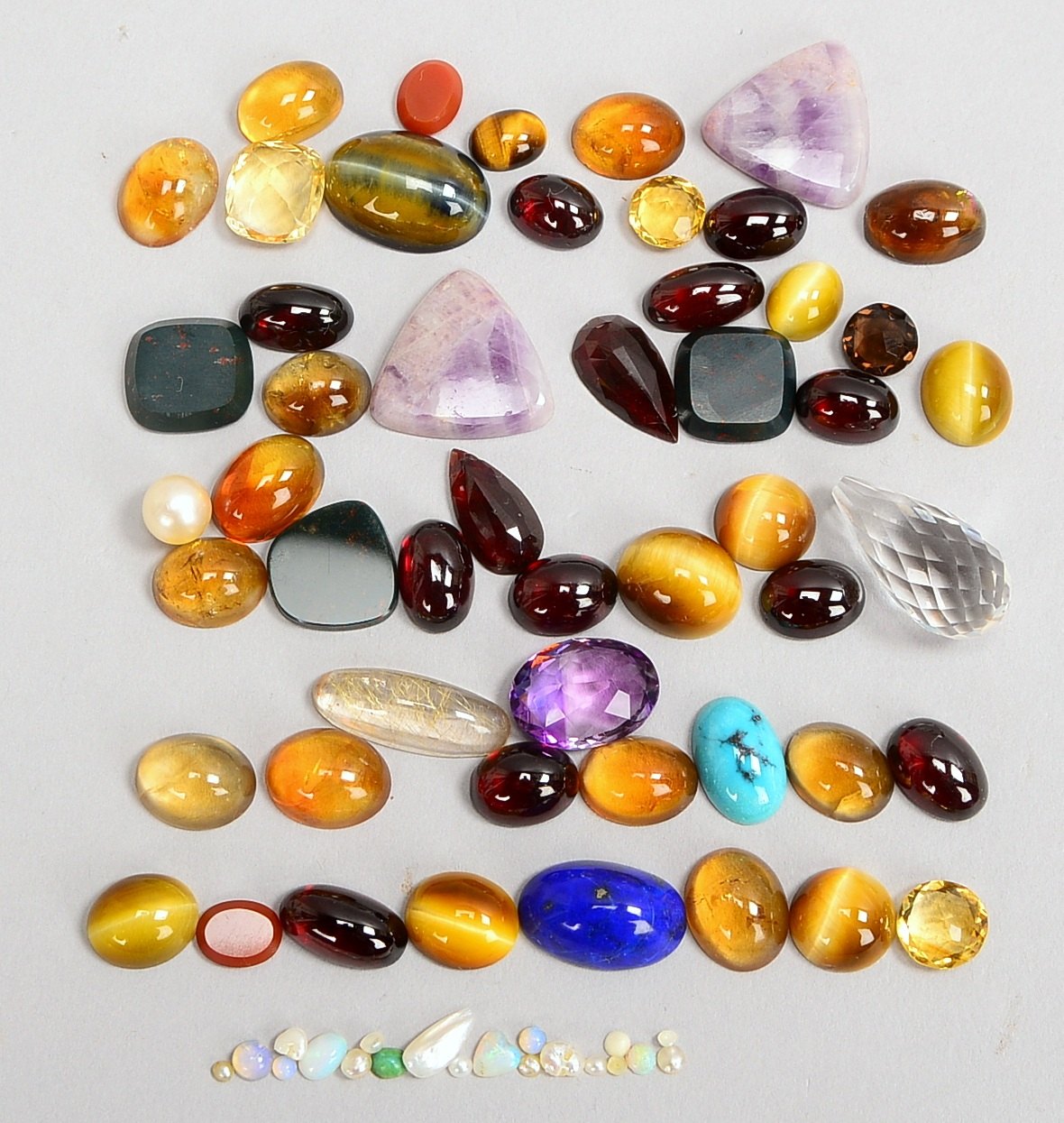 Edelstein-Sammlung (Tigerauge, Granat, Citrin, Bergkristall, u.a.) - überw. Cabochons