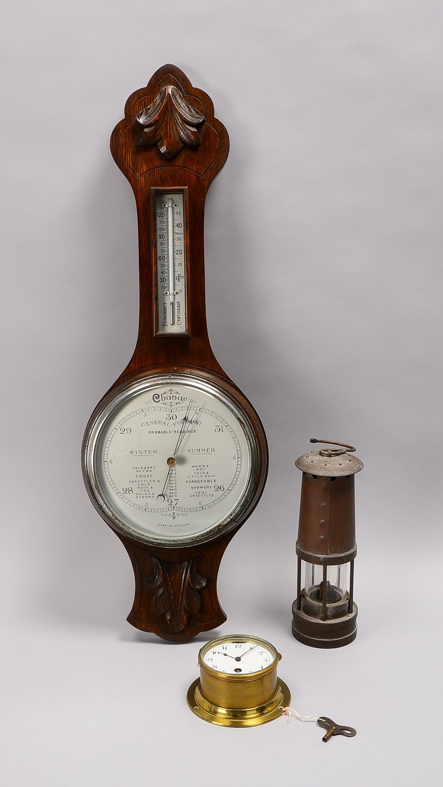 3 antike Sammlerobjekte: Schiffsuhr (Schweiz), Barometer (England), Waliser Grubenlampe