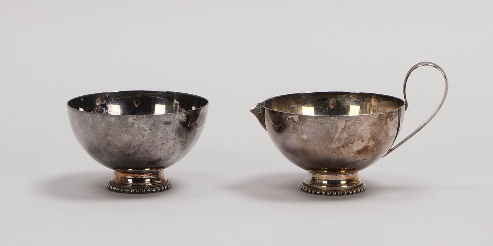 Zuckertopf und Sahnekännchen, 925 Silber, mit Perlrand-Dekor; Gewicht 150 g