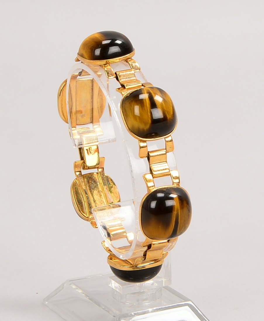 Armband, 375 GG/9kt Gold (gest.), mit 6 Tigeraugen-Cabochons; Gewicht 37,7 g
