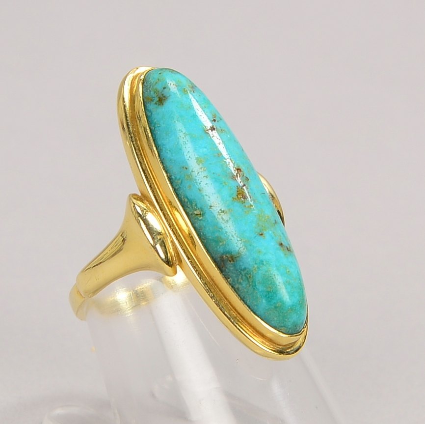 Ring, 585 GG (gest.), besetzt mit Türkiscabochon; RG 52, Gewicht 6,10 g