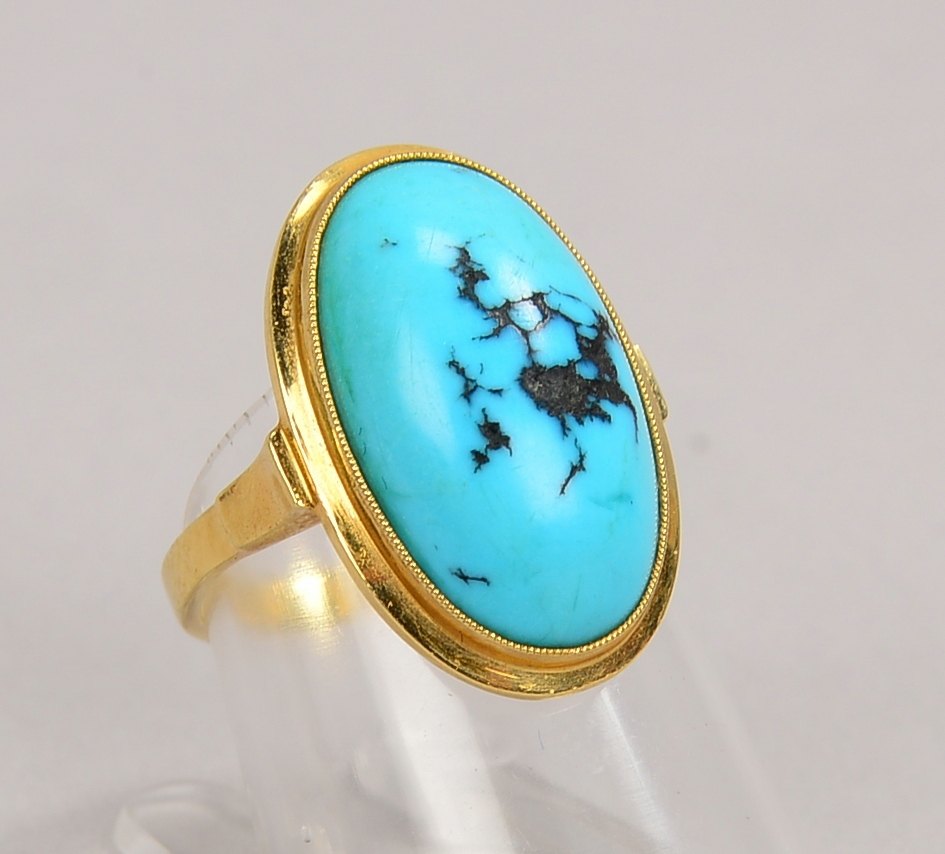Ring, 585 GG (gest.), mit Malachit-Cabochon; RG 51, Gewicht 5,10 g