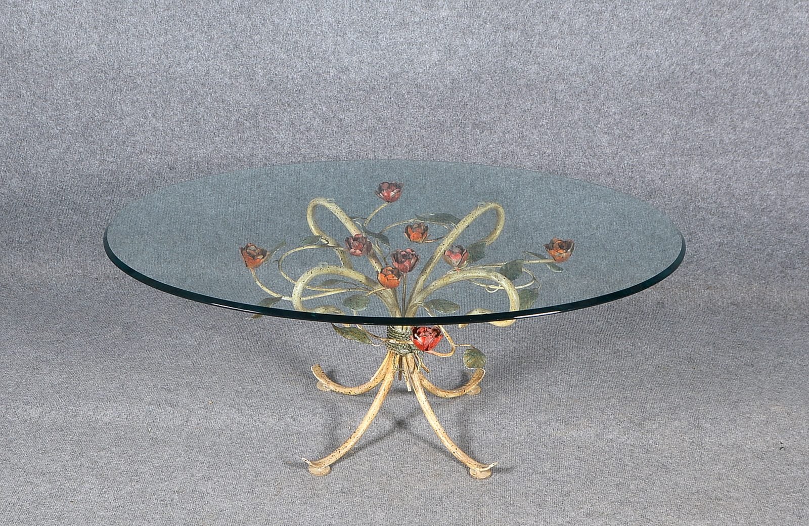 Florentiner Beistelltisch, ovale Glasplatte/farb. Metallgestell ('Rosenstrauß'), Entw. Hans Kögl