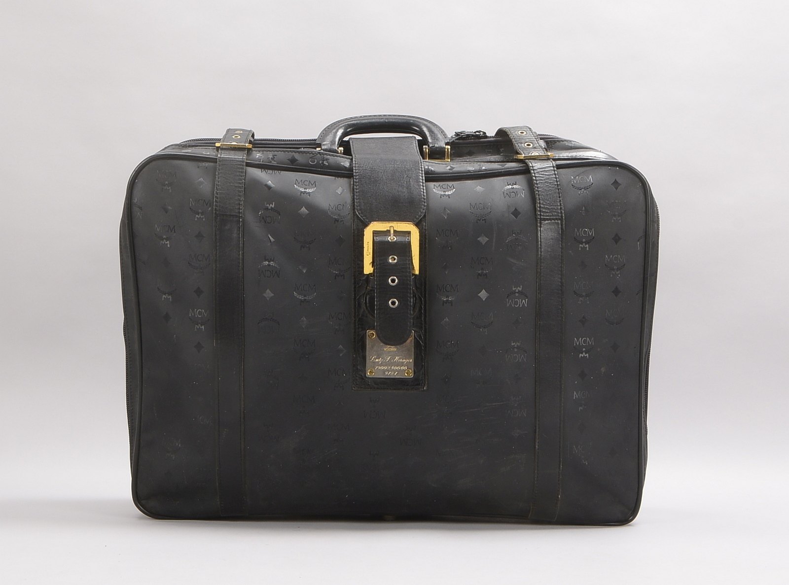 MCM, Reisekoffer, geprägtes Vinyl, Lederbesatz, Namensgravur; Breite 58 cm