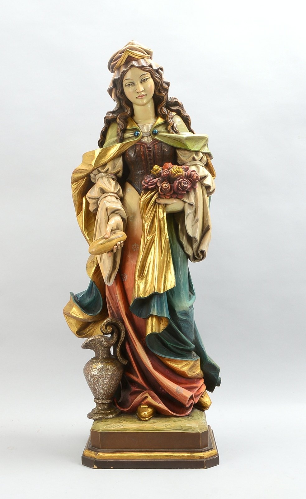 Sakrale Holzskulptur, 'Heilige Elisabeth' (in faltenreichem Gewand mit Schenkkrug, Brot und Rosen da