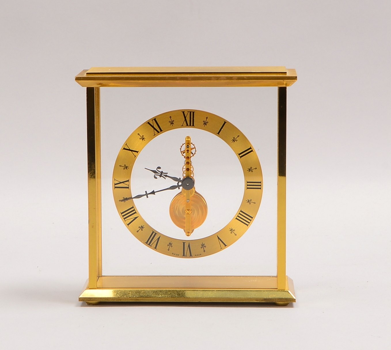 Tischuhr (Schweiz), Jaeger-LeCoultre, 8-Tage-Werk im Messinggehäuse/allseitig verglast, Ringziffernb