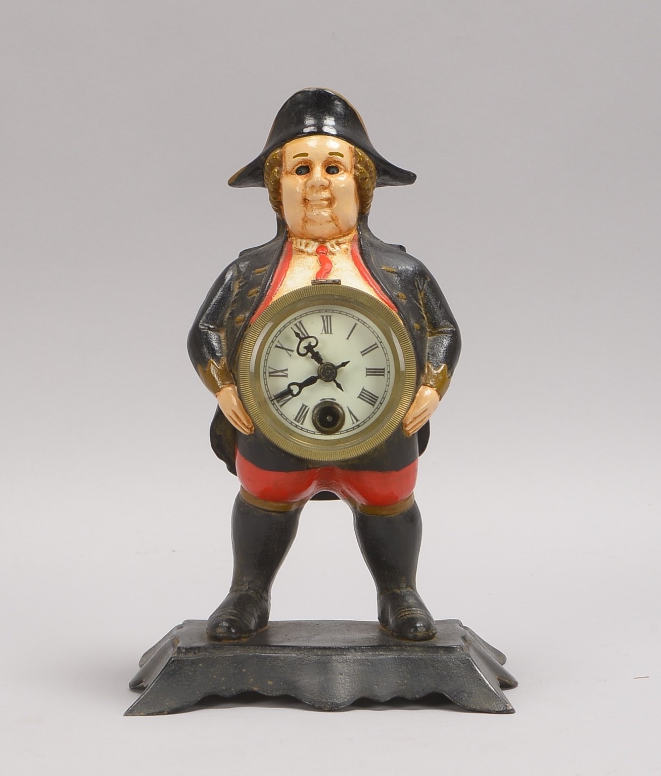 Augenwenderuhr, Eisenguss, Emaille-Ziffernblatt, bezeichnet/datiert; Höhe 25 cm