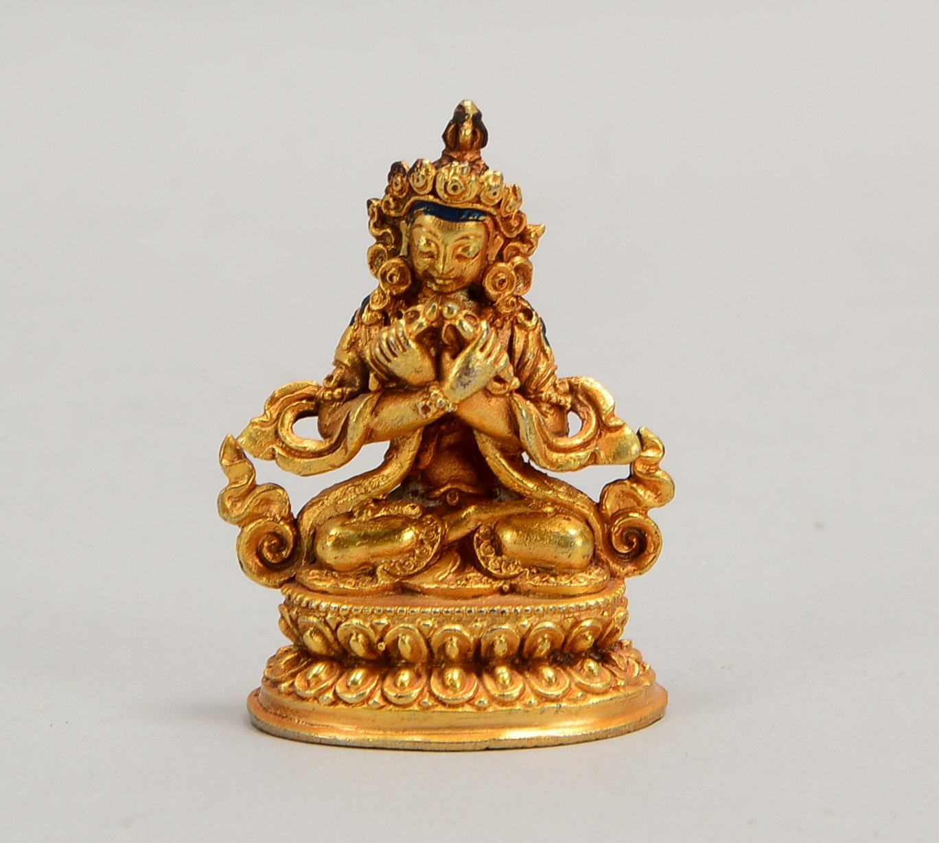 Bronzeskulptur (Indien/Nepal), 'Buddha' (in sitzender Haltung mit Handattributen dargestellt), Figur