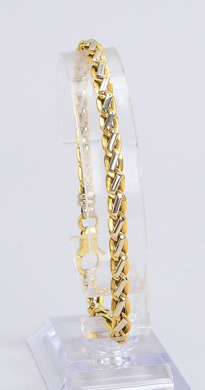Armband, 750 GG/WG (gestempelt), mit Karabinerschließe; Länge 21 cm, Gewicht 17,40 g