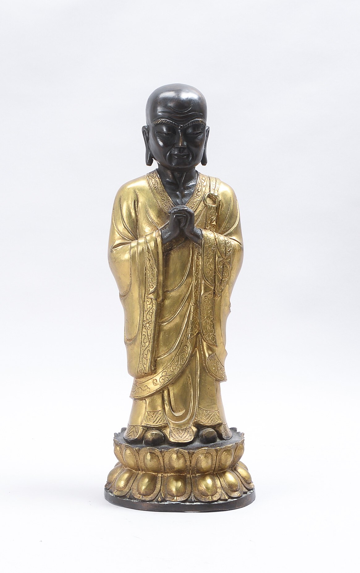Bronzeskulptur (Tibet), 'Lohan' - Darstellung eines Buddha-Jüngers in Anjali-Mudrahaltung mit gefalt