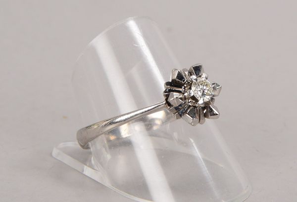 Ring, 750 WG (gestempelt), besetzt mit einzelnem kleinem Brillant von ca. 0,20 ct; RG 60