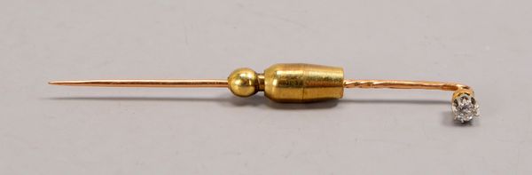 Krawattennadel, 585 GG (geprüft), besetzt mit einzelnem Diamant von ca. 0,10 ct, im Achtkantschliff