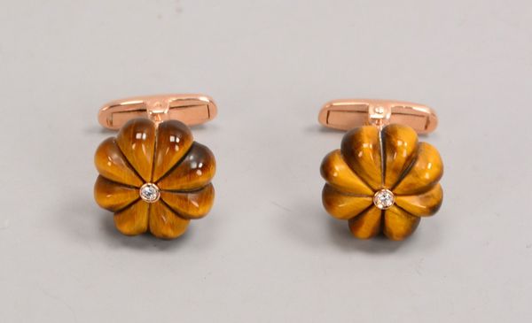 Paar Manschettenknöpfe, 9 kt Gold, mit Tigerauge und kl. Diamanten; Ø 14 mm