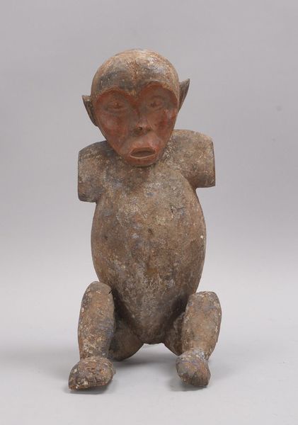 Holzfigur (Afrika - wohl Kamerun), 'Sitzender mit abgetrennten Armen'