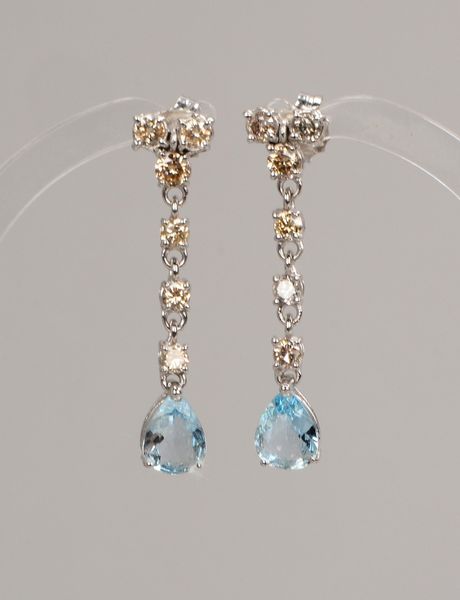 Paar Ohrstecker, 585 WG (gest), jeweils mit Aquamarin und 6x Brill./ca. 1,27 ct
