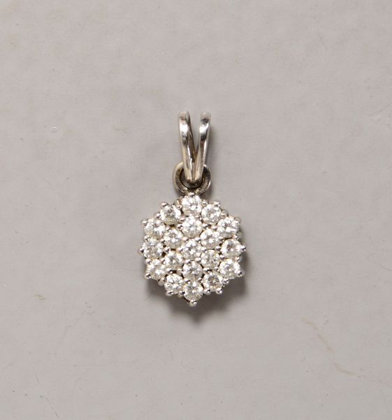 Anhänger, 585 WG (gest.), mit 19x Brill./zus. ca. 0,76 ct; Ø 11 mm, Gew. 2,60 g
