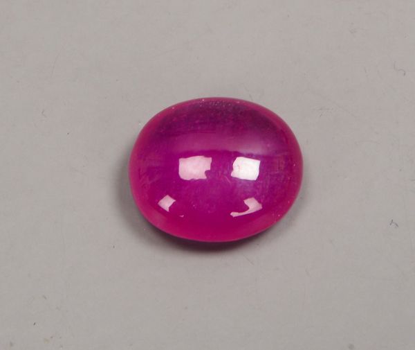 Loser Rubin (Afrika), ca. 33,90 ct, Stein im Cabochonschliff - behandelt