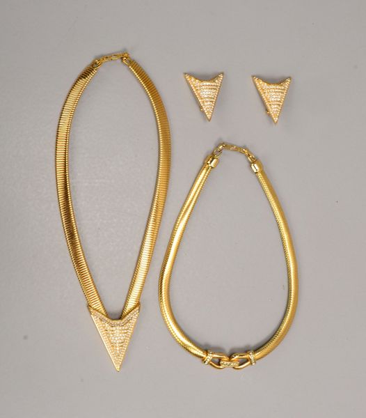 Modeschmuck, vergoldet, mit Steinbesatz: Chr. Dior-Collier/Ohrclips, Grossé-Collier