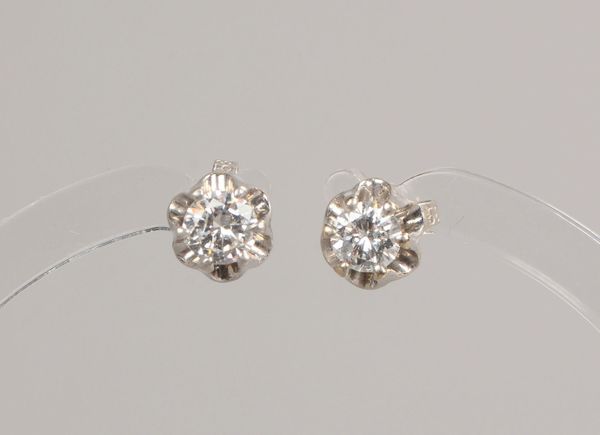 Paar Ohrstecker, 585 WG (gest.), mit je einzelnem Brill./zus. 0,63 ct; Ø 6 mm, Gew. 1,70 cm