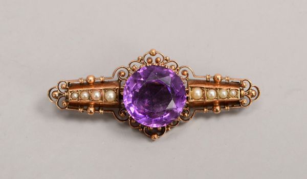 Brosche, 333 RG (gest.), .mit Saatperlen und fac. Amethyst im Rundschliff; Gew. 5,80 g