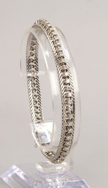 Armband (passend zu Pos. 4108), 750 WG (gest.), mit 57x kl. Brill./zus. ca. 1,60 ct