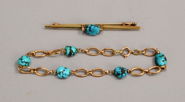 Schmuckset, 333 GG (gest.), 2-tlg., mit Türkisbesatz: Armband und Brosche; Gew. 11 g