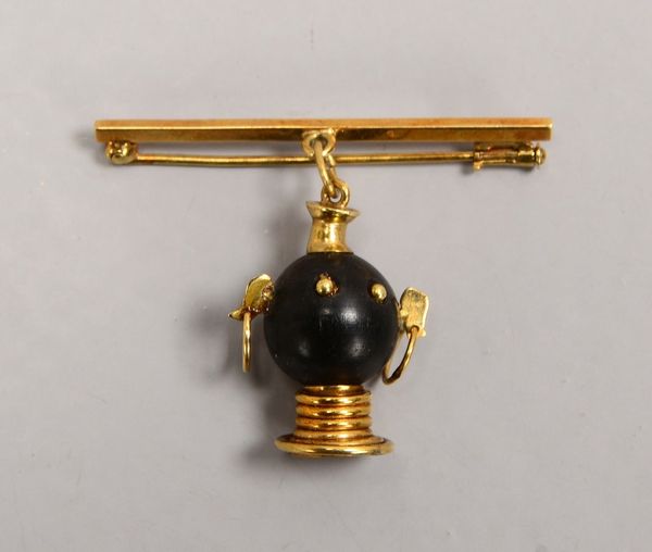 Brosche, 585 GG (gest.), mit figürl. Onyx-Behang ('Afrikaner-Kopf'); Länge 4 cm, Gew. 6 g