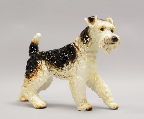 Goebel, Porzellanfigur, 'Terrier', farbig staffiert; Maße 29 x 40 cm