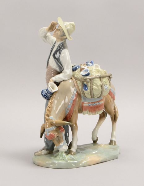 Lladro/Spanien, Porz.-Figur, 'Straßenverkäufer mit Esel', pastos polychr.